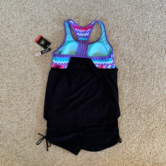 NWT - Zeroxposur Tankini/Shorts
2 pc Bathing Swim Suit
Black/Purple (Size 10) - Picture 2 of 6